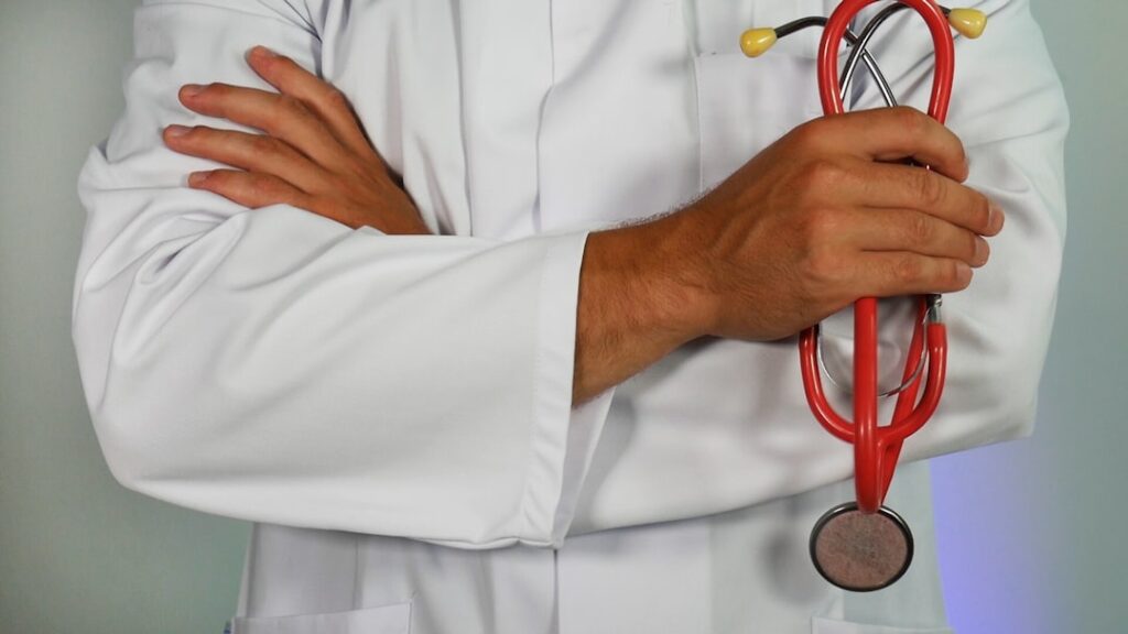 Photo by Online Marketing doctor holding red stethoscope